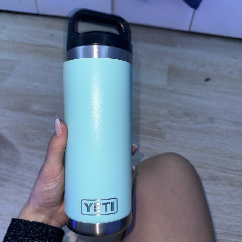 Yeti water bottle with extra lids